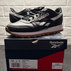 Reebok Women’s Classic Black and White Leather Sneakers